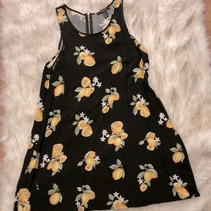 Black lemon print swing dress. Size medium. Great condition.